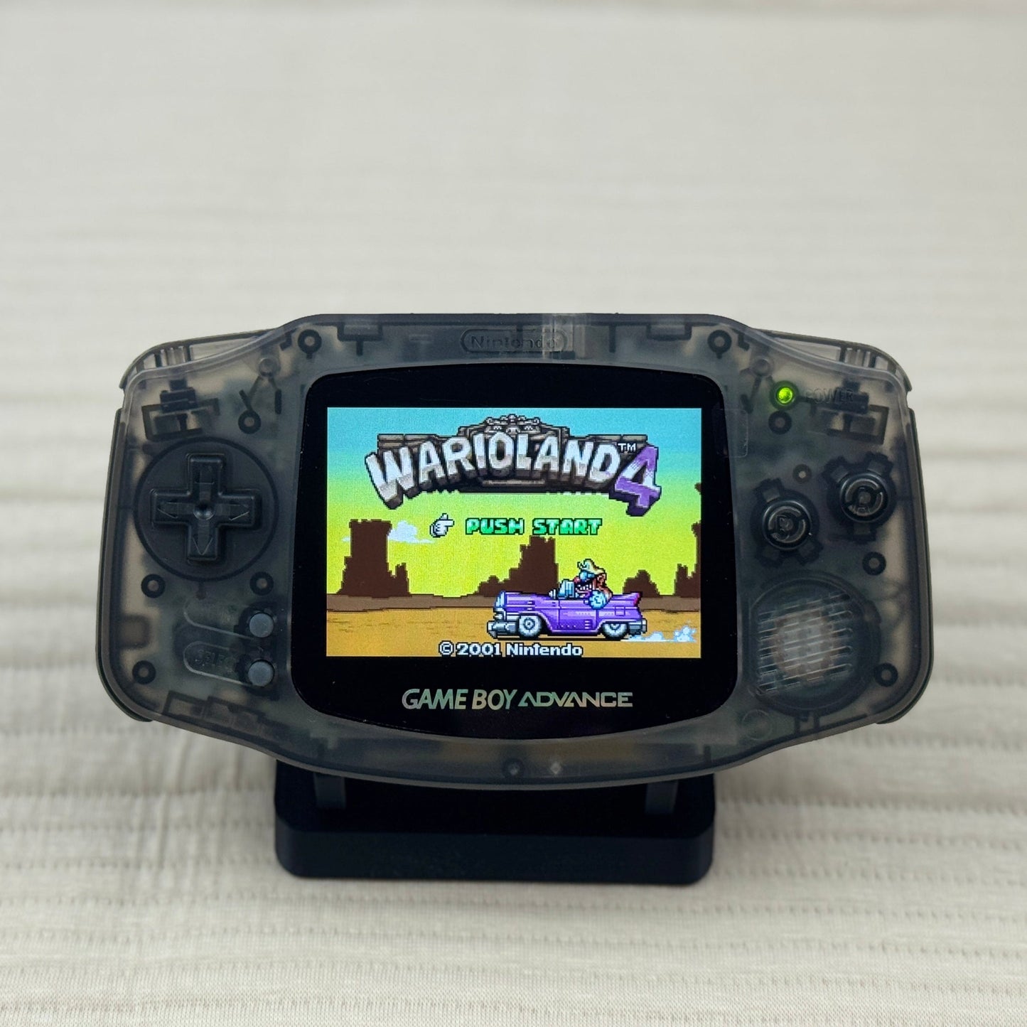Custom Game Boy Advance with IPS backlit screen and Sapphire shell by Circuit Rebel