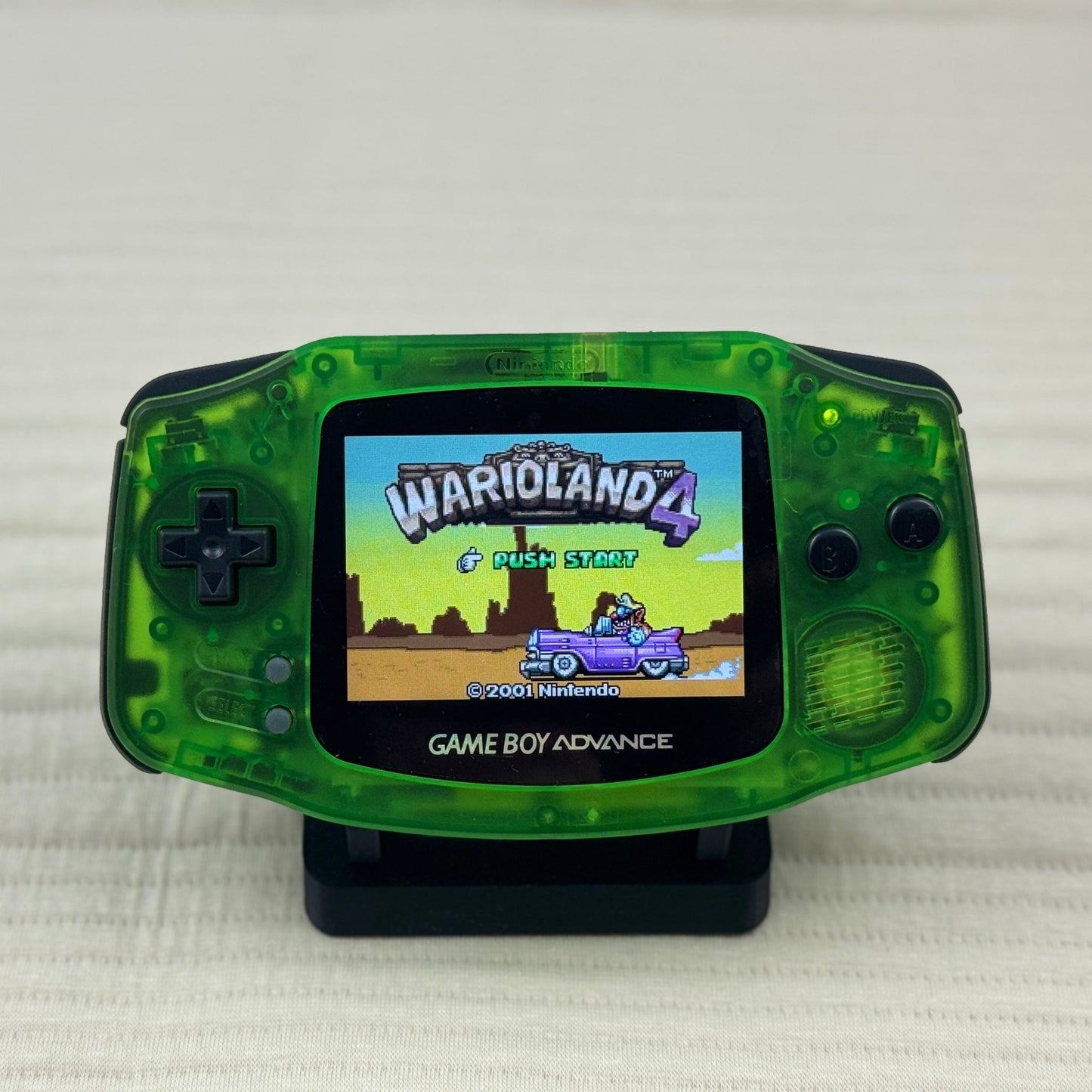 Custom Game Boy Advance with IPS backlit screen and Emerald shell by Circuit Rebel