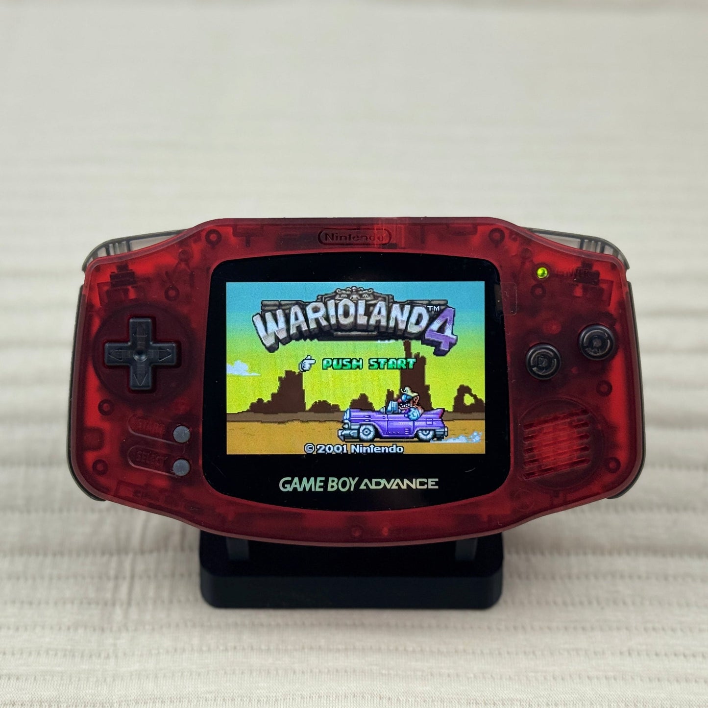 Custom Game Boy Advance with IPS backlit screen and Ruby shell by Circuit Rebel